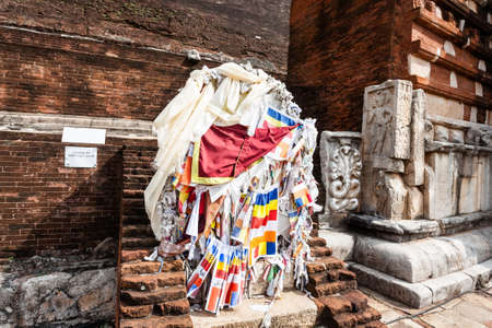 Buddhist flags at Jetavana Dagoba is one of the central landmarks in the sacred world heritage city of Anuradhapura, Sri Lanka, Asia.の写真素材