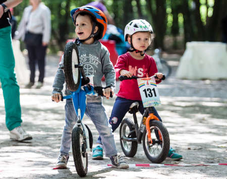 Kiev, Ukraine â September 9, 2017: Unknown young bikers, at the child amateur bicycle competition Â«We are the championsÂ».のeditorial素材
