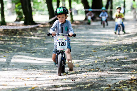 Kiev, Ukraine â September 9, 2017: Unknown young biker, at the child amateur bicycle competition Â«We are the championsÂ».のeditorial素材