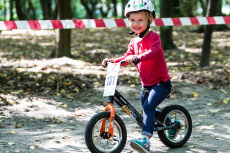 Kiev, Ukraine â September 9, 2017: Unknown young biker, at the child amateur bicycle competition Â«We are the championsÂ».のeditorial素材