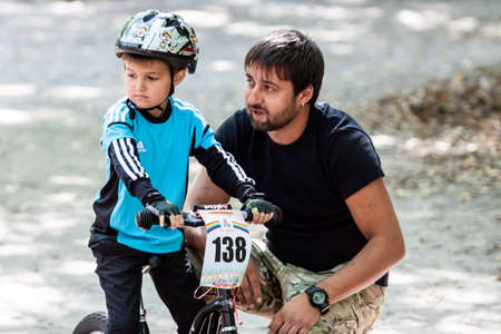 Kiev, Ukraine â September 9, 2017: Unknown young biker, at the child amateur bicycle competition Â«We are the championsÂ».のeditorial素材