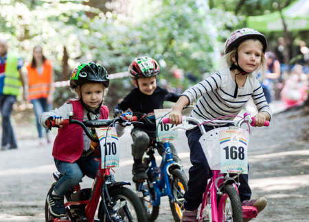 Kiev, Ukraine â September 9, 2017: Unknown young bikers, at the child amateur bicycle competition Â«We are the championsÂ».のeditorial素材