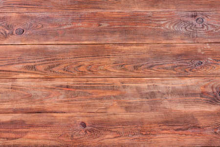 Vintage shabby red painted wood texture as background.の写真素材