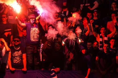 Kyiv, Ukraine - May 19, 2018: Fans at the stadium tribunaha with flyers. Ukrainian Premier League...