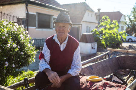 Bran, Romania - August 13, 2019: Unknown man in romanian national wear riding a horse.のeditorial素材