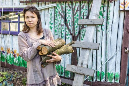 Woman relaxing at village countryside.の写真素材