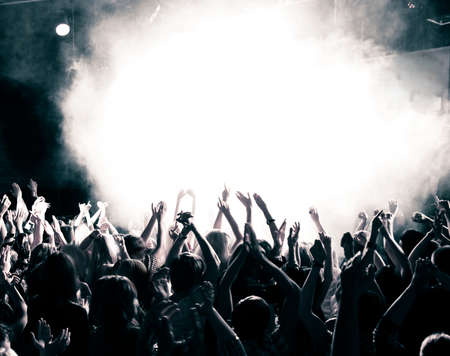 Concert crowd, hands up, tonedの写真素材