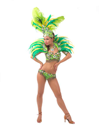 Female samba dancer wearing colorful costume over white backgroundの写真素材