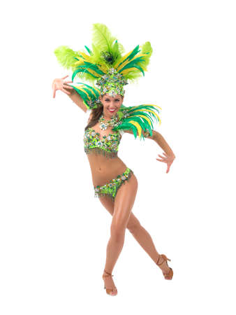Female samba dancer wearing colorful costume over white background