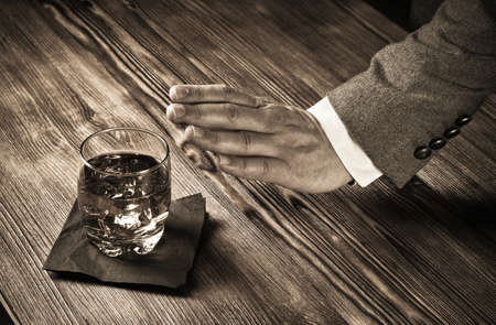 Gesture indicating refusal to drink, no to whiskeyの写真素材