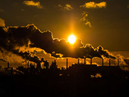 Contamination of environment by heavy smoke from industrial plant