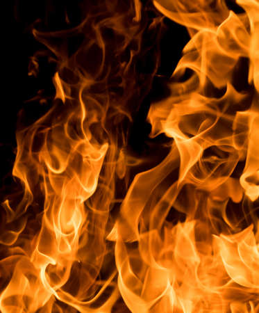 Closeup of bright flames of fire on black background