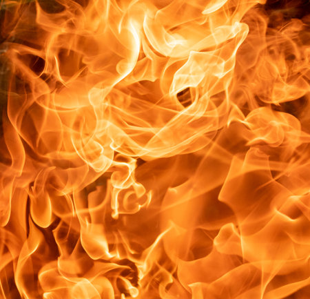 Blazing flames of fire on black background