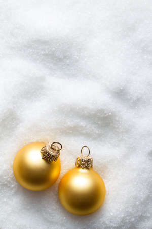 Christmas balls on snowの写真素材
