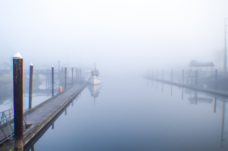 Sailboat in the mistの写真素材