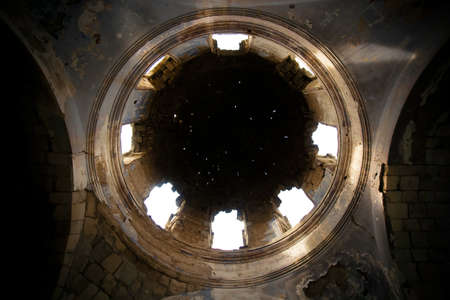 Stars formed by the incidence of light through the hole in the dome of an abandoned Orthodox Cathedral in Crimeaのeditorial素材
