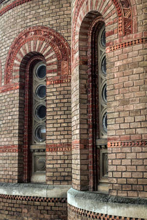 Windows on the stone, red-brick walls in the building of the Chernivtsi University in western Ukraineのeditorial素材