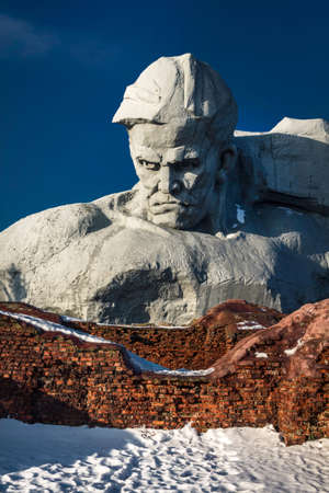 A monument to Soviet soldiers liberators of the Brest Fortress in Belarus. Monumental stone image of a soldier with a gloomy faceのeditorial素材