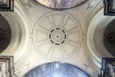 Archway in the palace in the heart of Budapest with a simple white dome. The geometric shape of a...