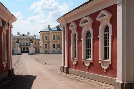 Summer view of the Rundale Palace from the time of the Russian Empire in Latvia. Baroque building under a clear blue sky and clouds.のeditorial素材