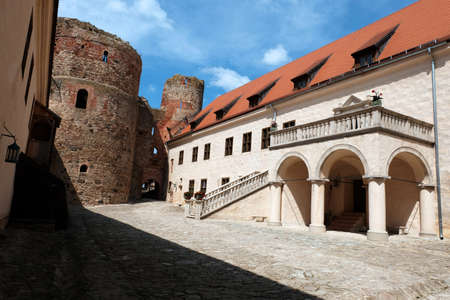 Summer view of the interiors and exteriors of the Bauskai castle with ruins and a renovated part in Latvia on a sunny summer dayのeditorial素材