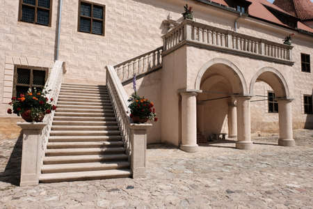 Summer view of the interiors and exteriors of the Bauskai castle with ruins and a renovated part in Latvia on a sunny summer dayのeditorial素材