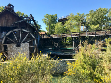 Salou, Spain, June 2019 - A house with bushes in front of a bridge. High quality photoの写真素材