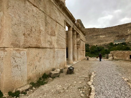 Amman, Jordan, November 2019 - A stone building that has a sign on a brick wall. High quality photo