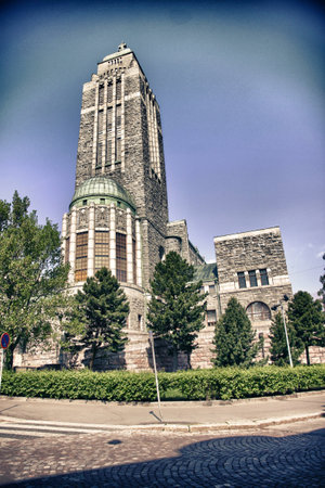 Helsinki, Finland, February 2018 - A clock tower in front of a building. High quality photoの写真素材