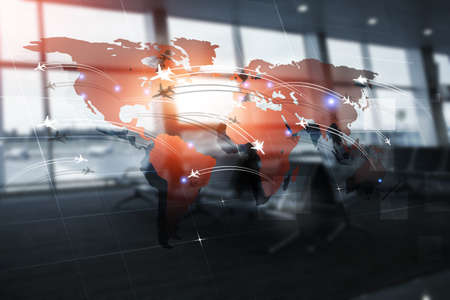 business aviation background with planes on world map on blurred airport terminal. mixed mediaの写真素材