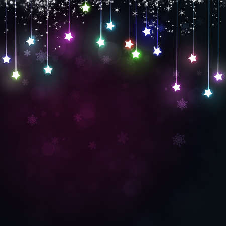 multicolor christmas star lights background with bokeh and snowの写真素材