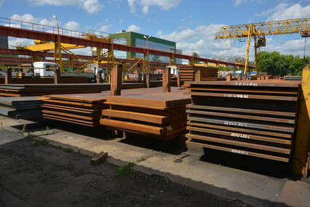 Steel plate. Metal sheet. Hot-rolled flat steel. Metal leaf. Rusty ferrum. Heavy steel plates. Metal sheets in warehouse.の写真素材