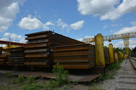 Steel plate. Metal sheet. Hot-rolled flat steel. Metal leaf. Rusty ferrum. Heavy steel plates. Metal sheets in warehouse.の写真素材