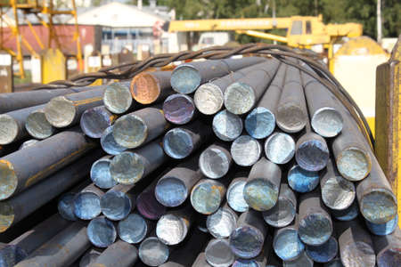 Metall rolled bar. Steel round. Carbon bar. Hot rolled ferrum. Rounded metal. Circle bar.