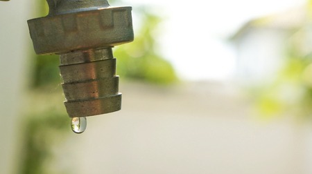 Leak drop water from faucet. It need to maintenanceの写真素材