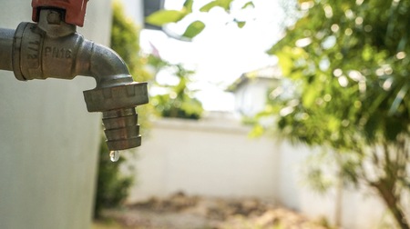 Leak drop water from faucet. It need to maintenanceの写真素材