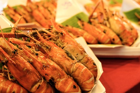 Lobsters are grilled and ready for sale on market.の写真素材