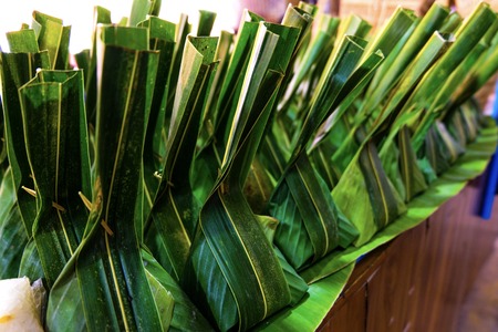 Thai dessert in natural packaging which is ecology design and friendly design with environment because it can degradable by nature.の写真素材