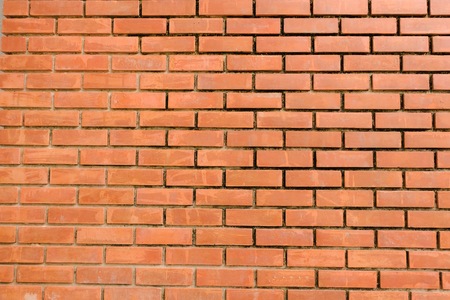 orange brick wall for interior and exterior. It is decorative for fence and wallpaper.の写真素材