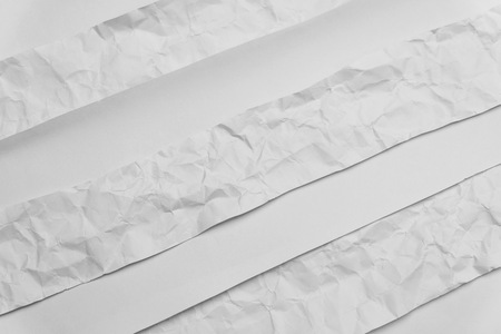 scrap of white paper wrinkled and smooth for background and texture.Copy space concept.の写真素材