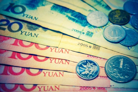 China Yuan banknote and coins for saving and investment concept.の写真素材