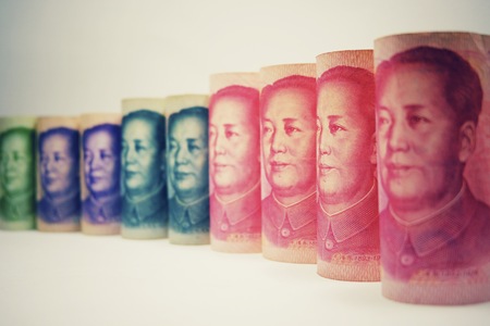 Multi color China Yuan banknote on white background.の写真素材