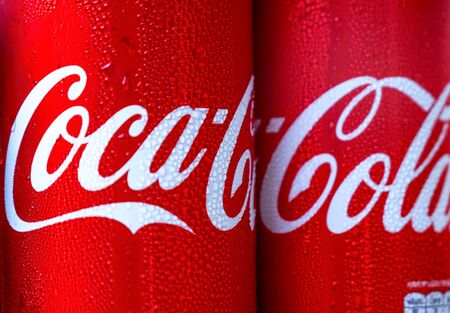 BANGKOK, THAILAND - OCTOBER 23, 2018: Coca-Cola logo with droplets on red can background. Coca-Cola...