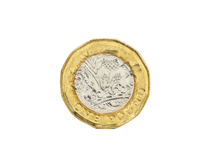 Close up isolated of one pound coin from united kingdom on white backgroundの写真素材