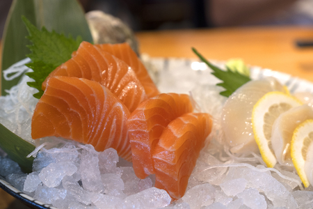 Close up fresh salmon Sashimi or salmon slice on iceの写真素材