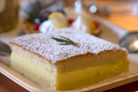 Close up of layer cake with white sugar on topの写真素材