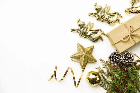 Christmas and Happy new year composition, Christmas present gift boxes,pine cones, fir branches, red ball on wooden white background. Flat lay, top view, copy space.の写真素材