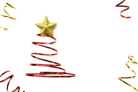 Merry Chistmas tree made from red ribbon and gold star on white background. Merry chirstmas and happy new year concept.の写真素材
