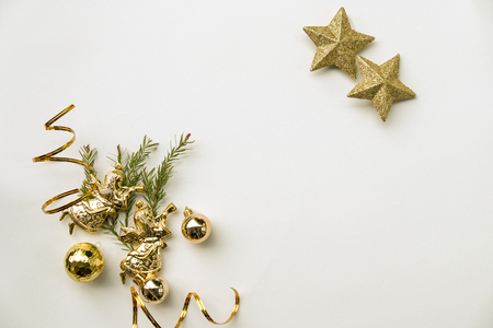 Christmas and Happy new year composition, Christmas present gift boxes,pine cones, fir branches, red ball on wooden white background. Flat lay, top view, copy space.の写真素材