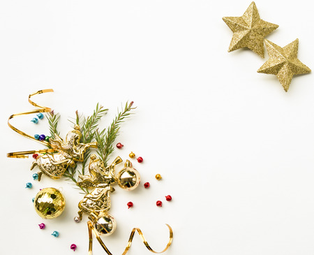 Christmas and Happy new year composition, Christmas present gift boxes,pine cones, fir branches, red ball on wooden white background. Flat lay, top view, copy space.の写真素材